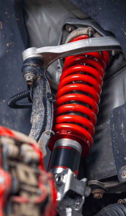 Porsche Cayenne 955/957 & VW Touareg Gen 1/1.5 Nitrogen Coilovers – 9-Step Adjustable (2002–2010) - OverlandtrekLift Suspension SystemOverlandtrekOT-UNI-LK-COILPorsche Cayenne 955 (2002–2007)Nitrogen coilover installed on a Porsche Cayenne, shown with the upper control arm