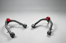 Porsche Cayenne 955/957 & VW Touareg 3-inch lift kit (2002–2010) — blue anodized spacer set, detail view